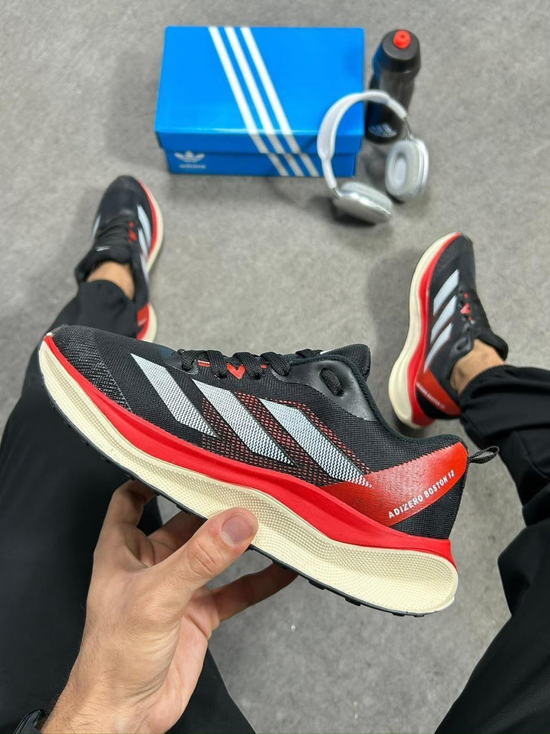 ADIZERO BOOST PRETO E VERMELHO